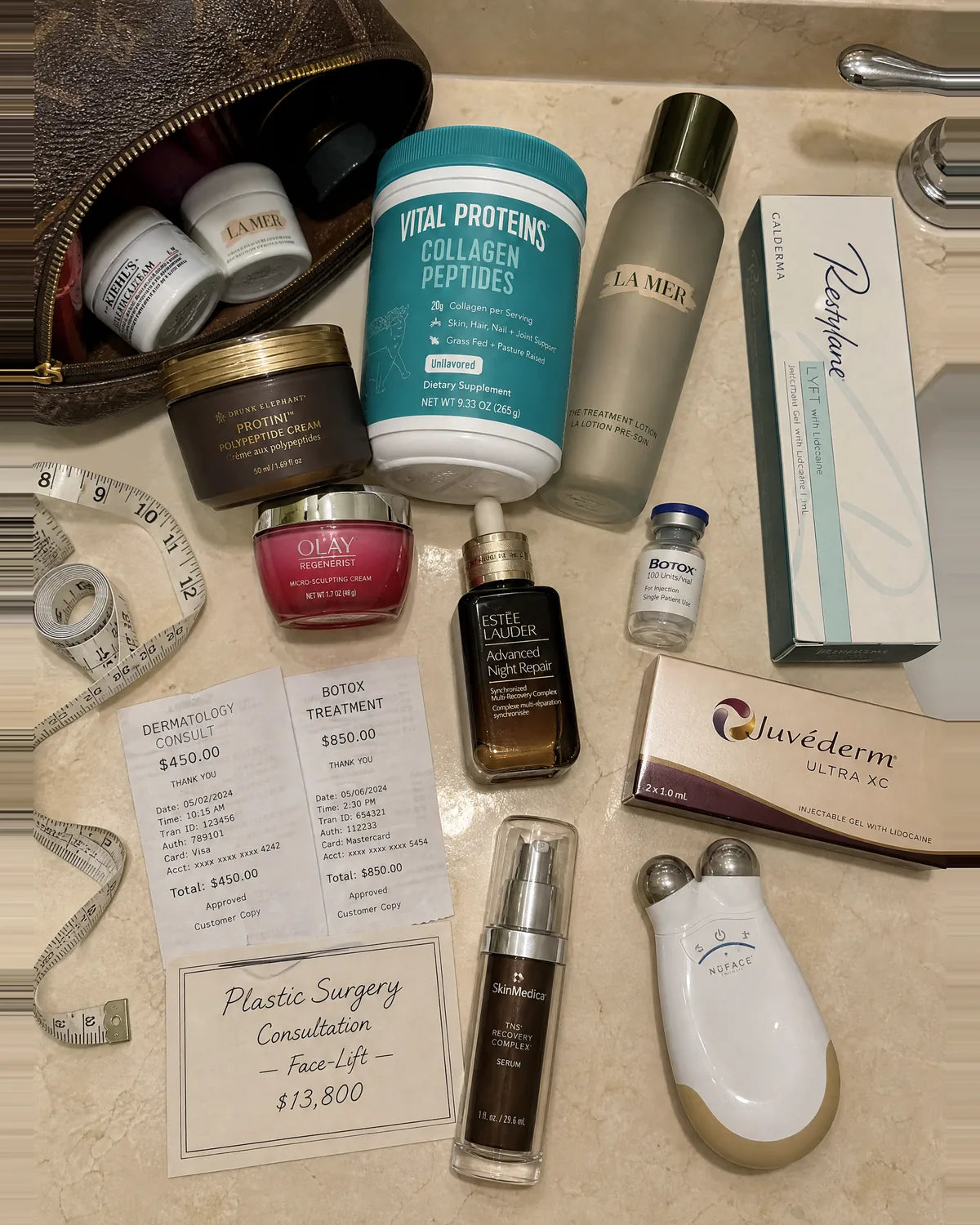 Overhead bathroom counter showing real failed loose-skin solutions: Drunk Elephant, Olay Regenerist, Vital Proteins, Estée Lauder, La Mer, Botox vial, Restylane, Juvederm, NuFACE device, SkinMedica TNS, and a Plastic Surgery Consultation card for $13,800